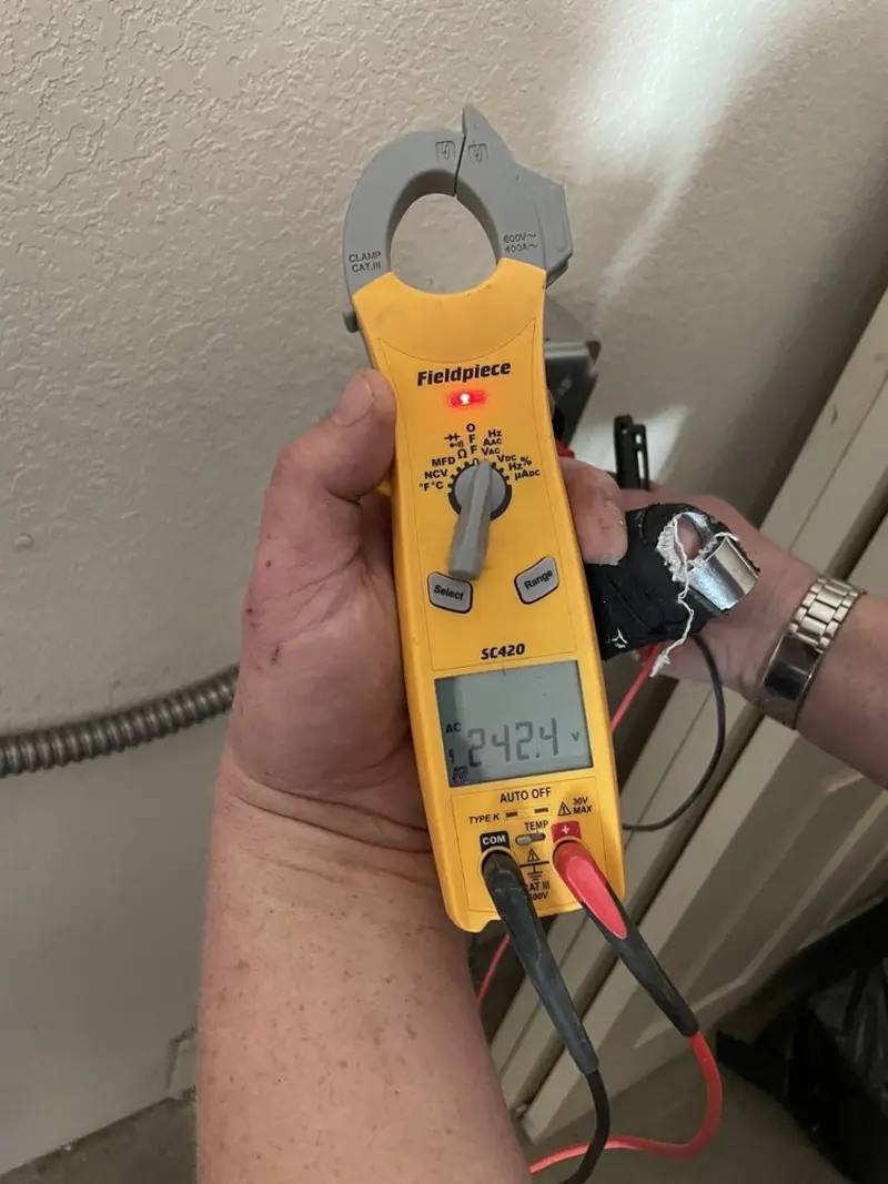 Voltage testing with clamp meter during Generator Installation in Calera